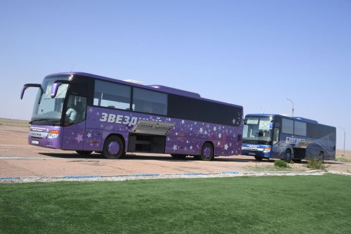 Zvyozdniy Gorodok (purple bus on floatl) and Baikonur (blue bus on floatr)