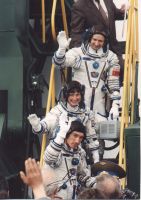 TM-12 crew at the launchpad